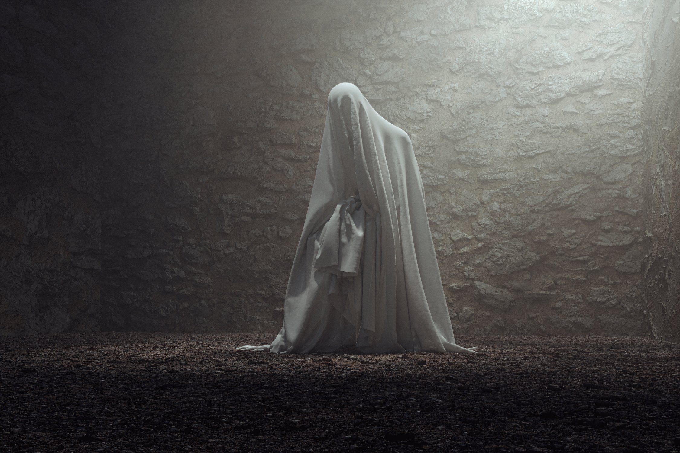 Spooky ghost in old stone basement